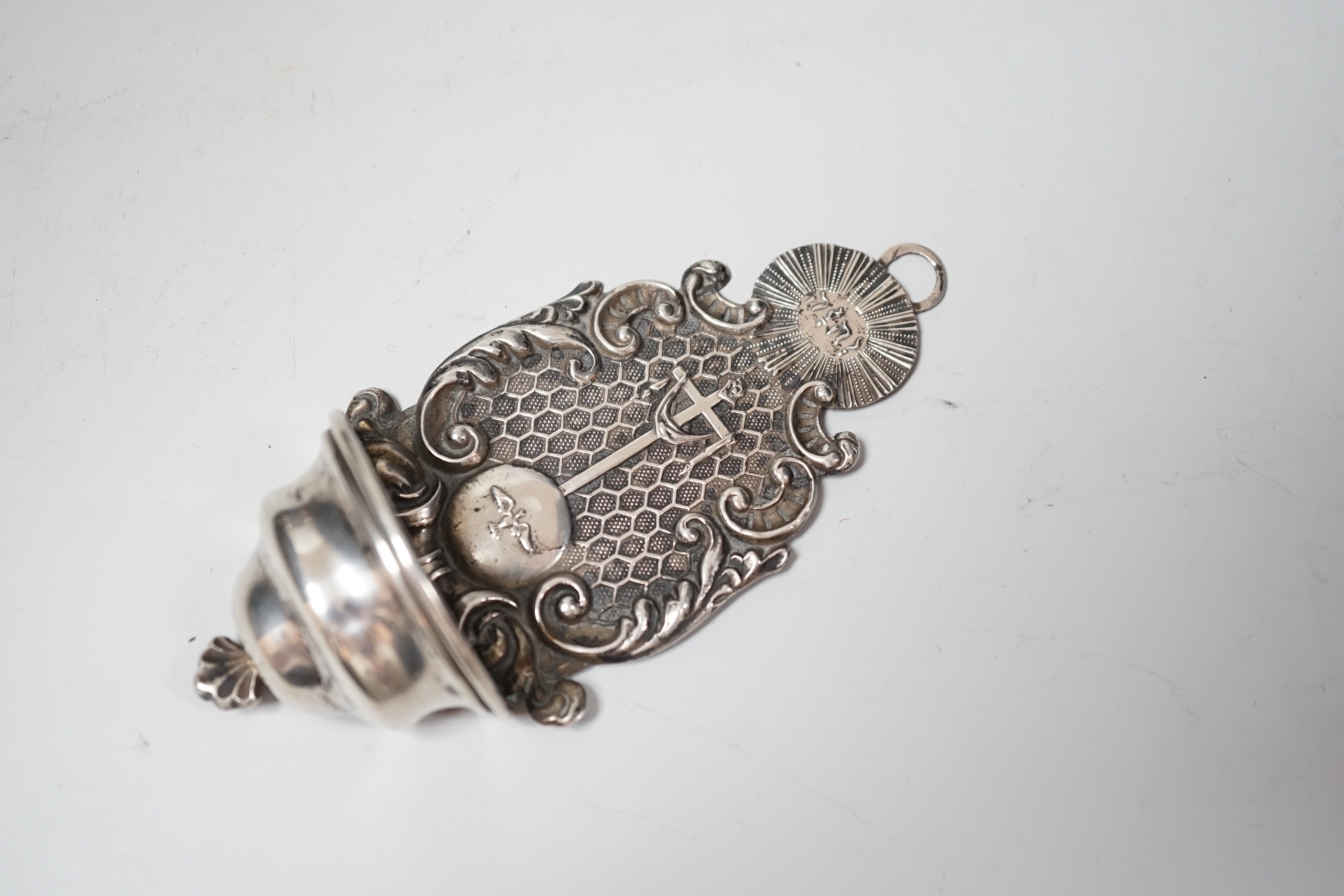An early 19th century Viennese repousse white metal holy water stoup, 11.4cm, together with a cased 1930's silver spoon and mounted silver bowl.